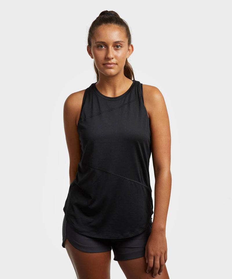 A model poses in the Advance women's workout tank in black.